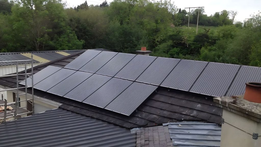14 black solar panels on business roof