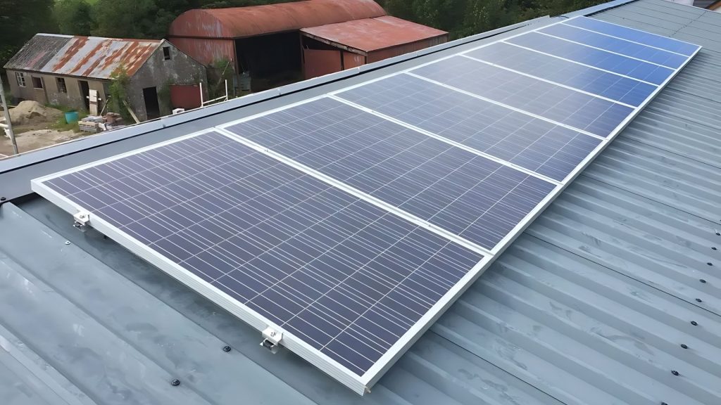 8 solar panels on farm building roof