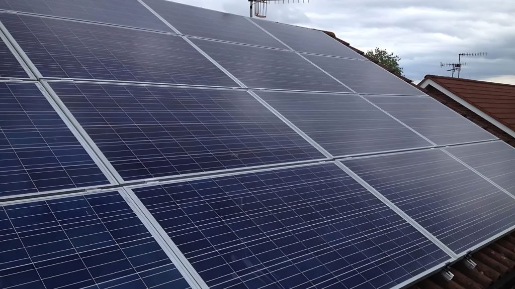 neat row of blue solar panels on home roof